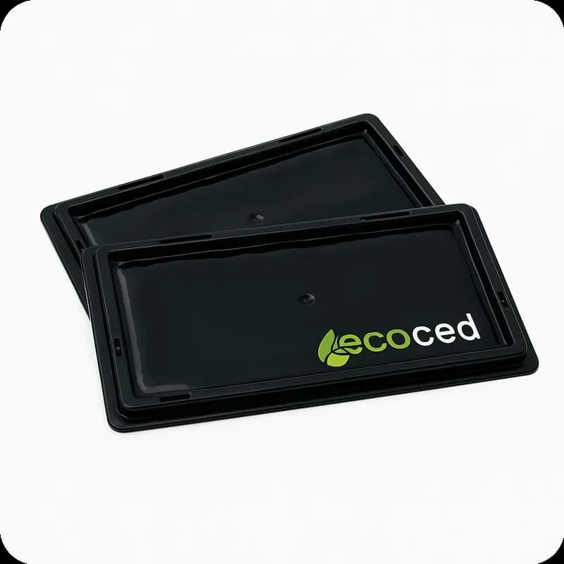 Duas placas de cola pretas para captura de ratos e ratazanas, com logótipo Ecoced visíve