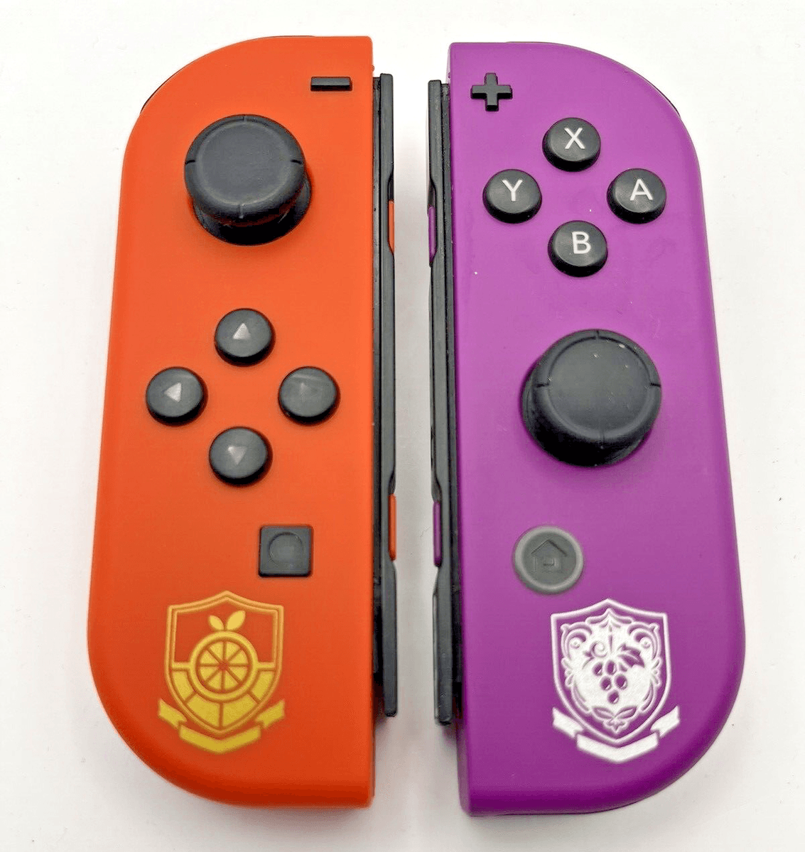 Par de Comandos Joy-con Vermelho e Roxo